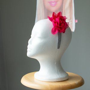 Silver glittery headband with pink flower